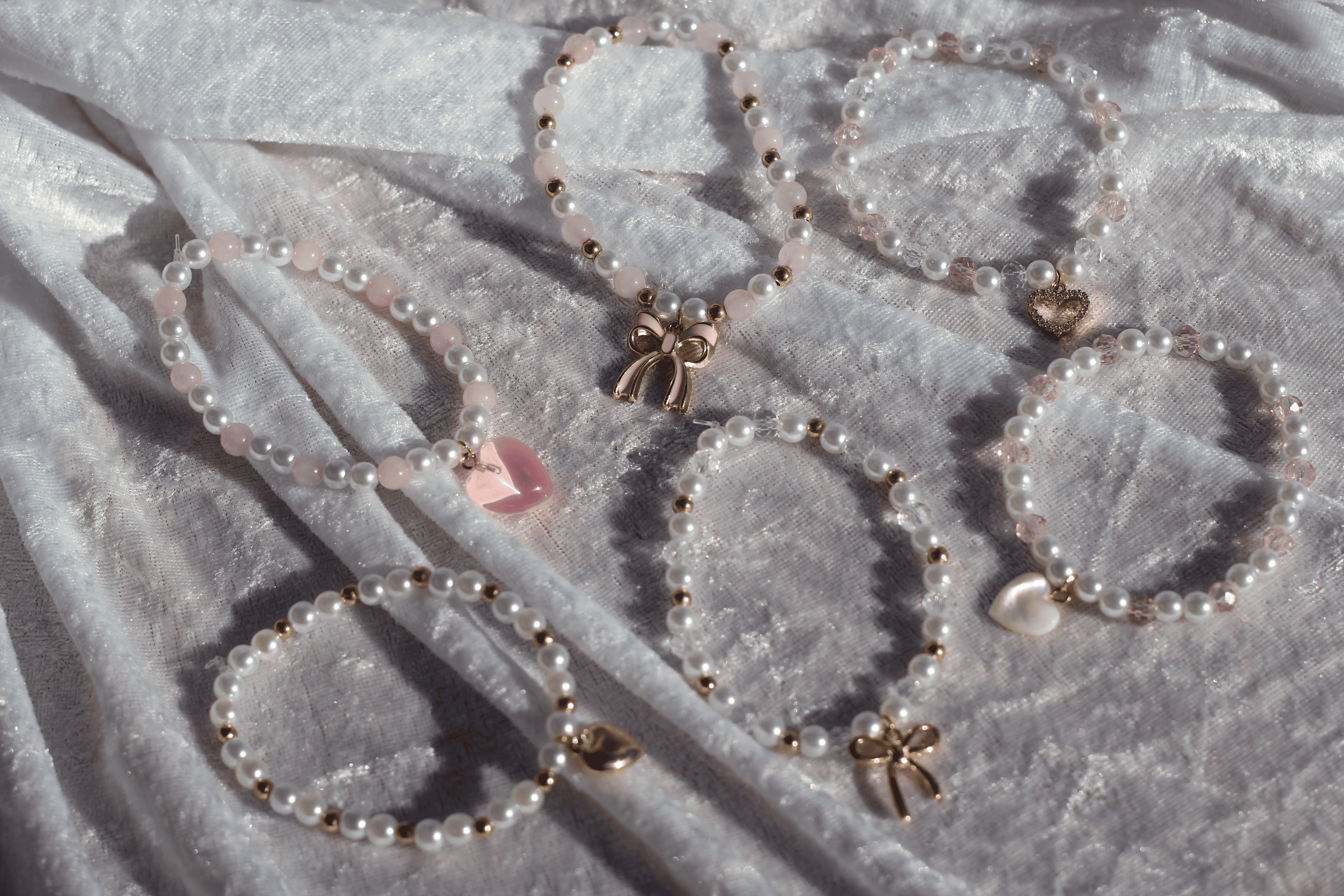 Darling pearl and iridescent crystal bracelet with rhinestone heart charm