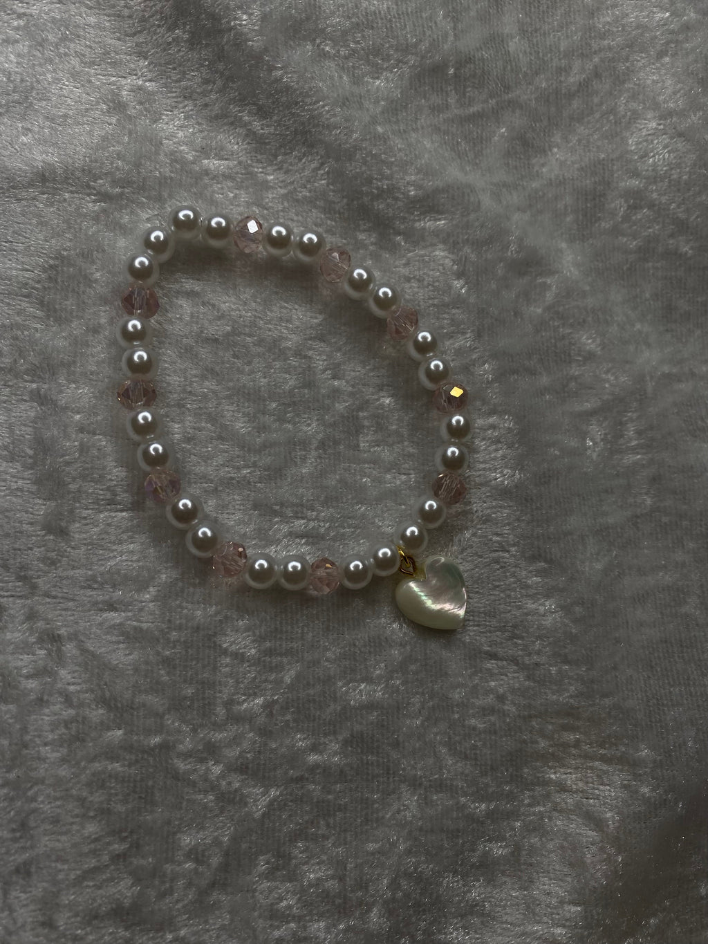 Sweetheart pink bead and pearl bracelet with gold bow charm
