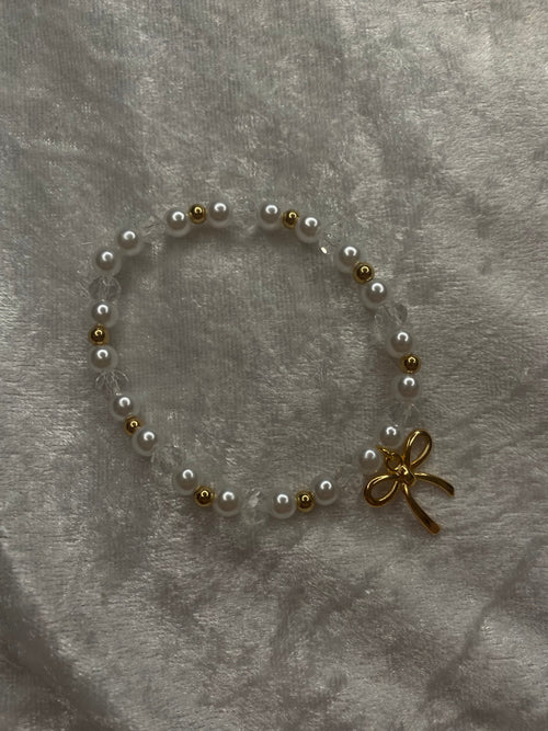 Love Letter white pearl and gold bead bracelet with gold bow charm